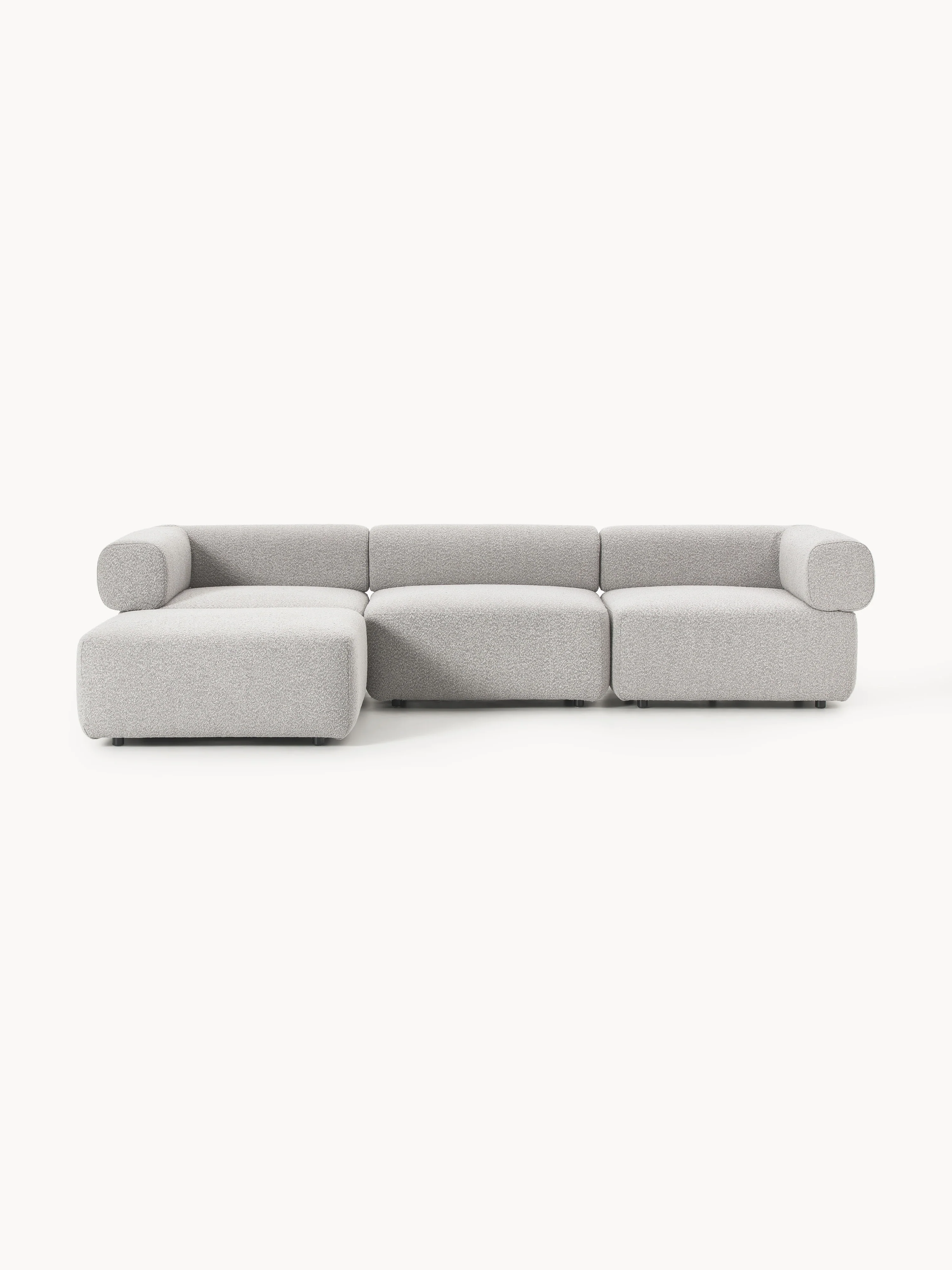 Modulaire bank Anton (4-zits) met poef (links/rechts) van bouclé