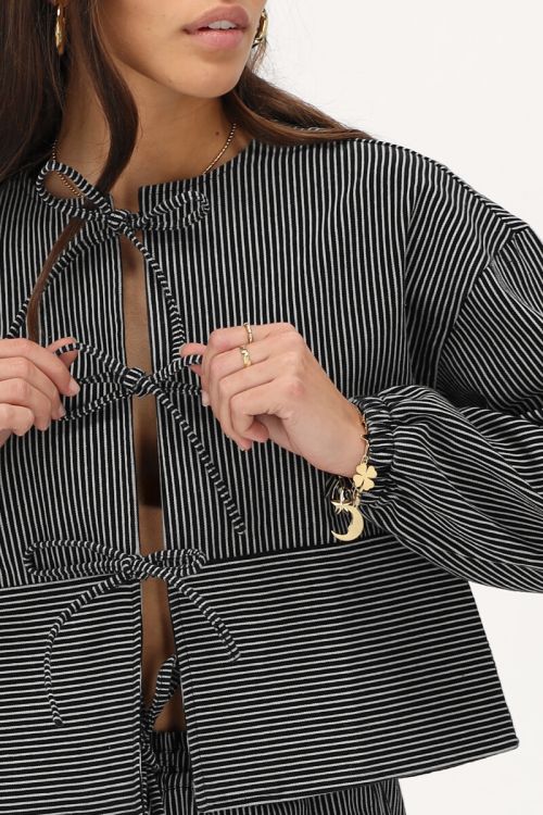 Zwart-wit gestreepte top met strikjes