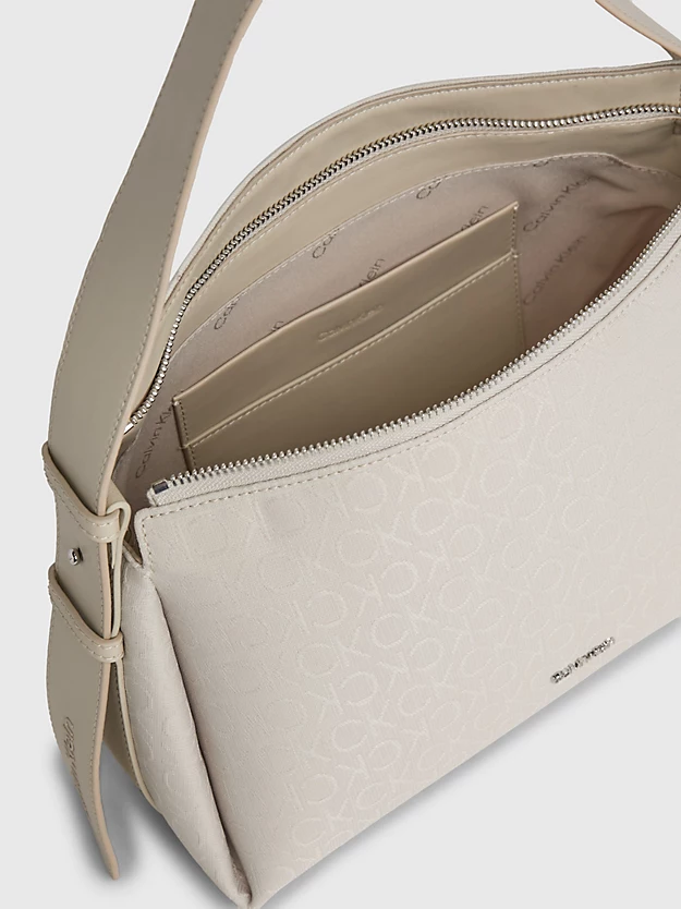 Bolsa de ombro em jacquard com logotipo.