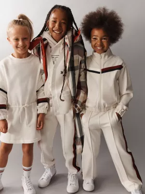 Calças de corrida Global Stripe com punho na barra