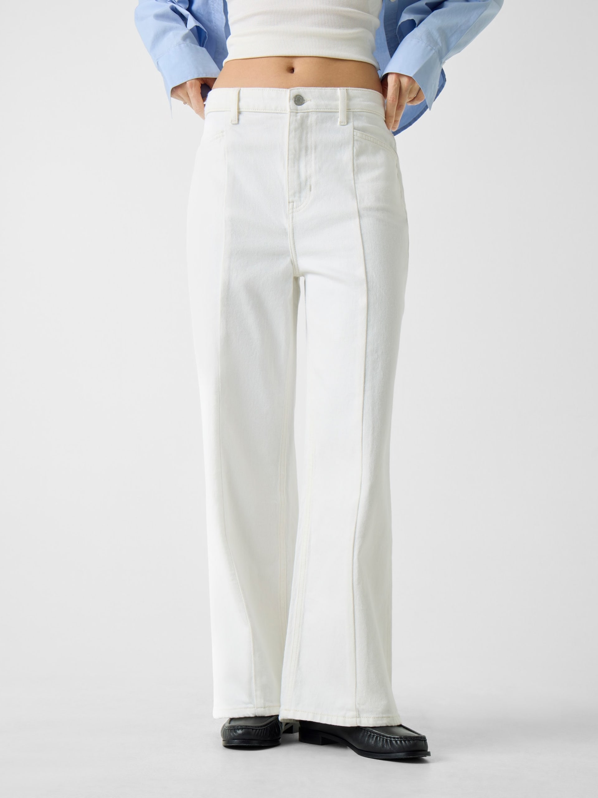 Calça jeans cropped de perna larga com costura G11