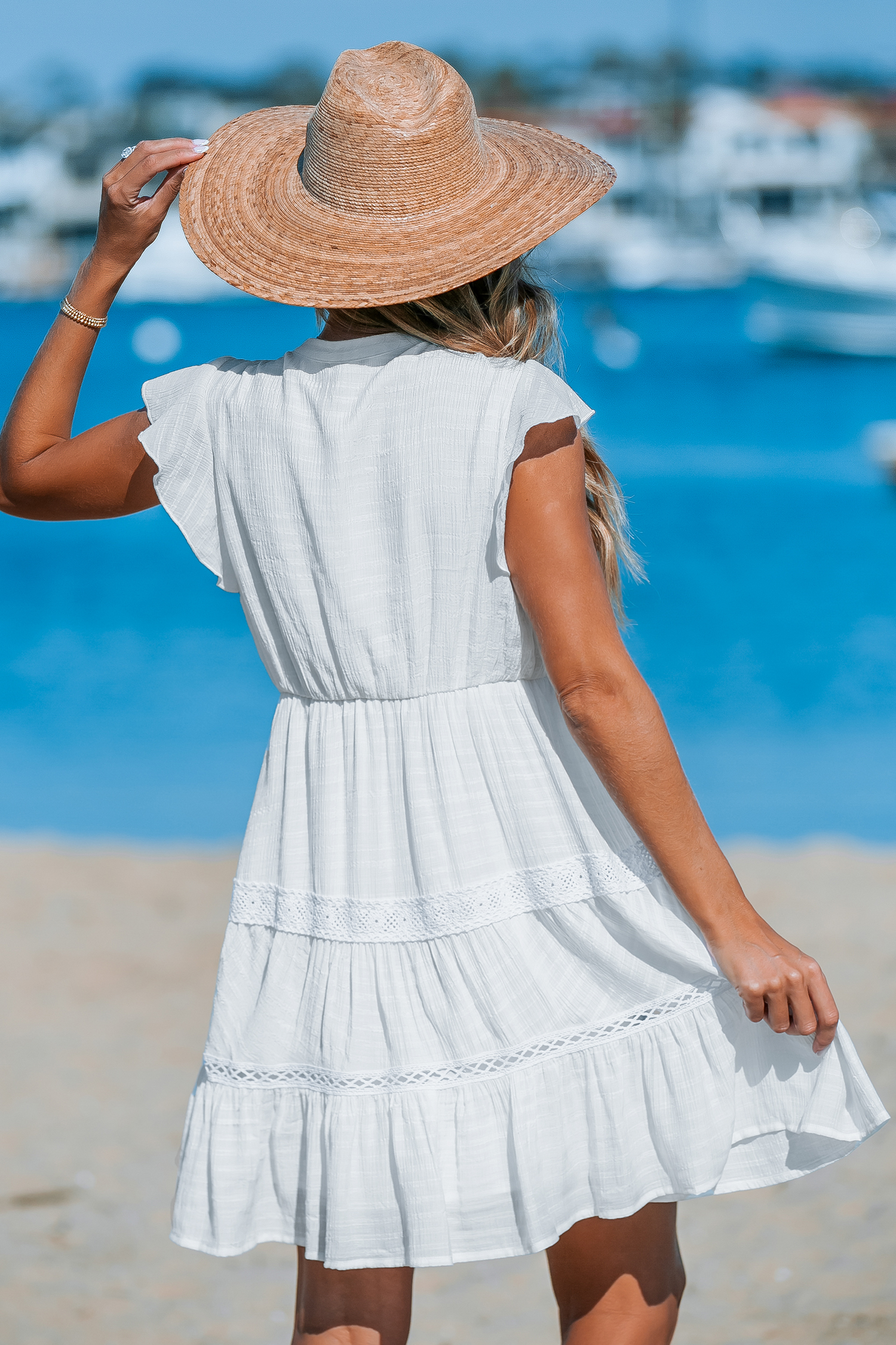 Robe mini avec col fendu en dentelle à glands blanche