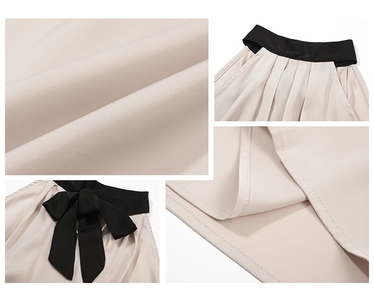 Verona Sing - Mouwloze blouse met col en twee kleuren / midi-kokerrok