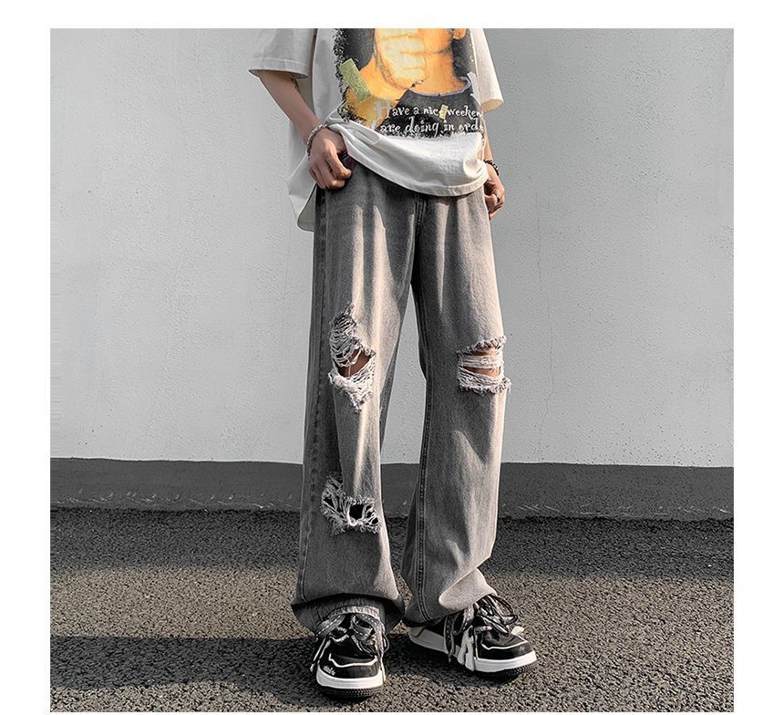 Plummie - Hoge taille jeans met wijde pijpen en distressed look