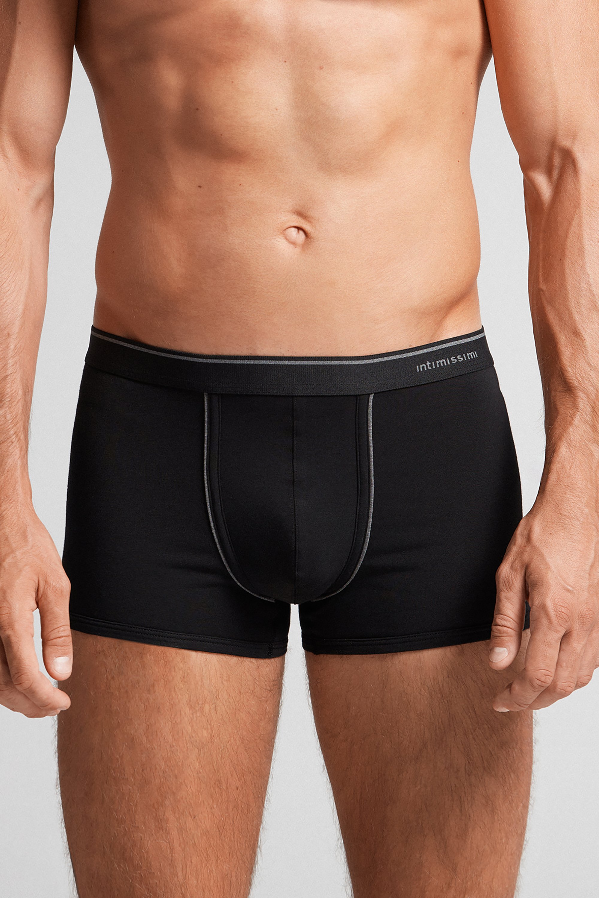 Cuecas boxer em algodão Supima® com elástico visível.