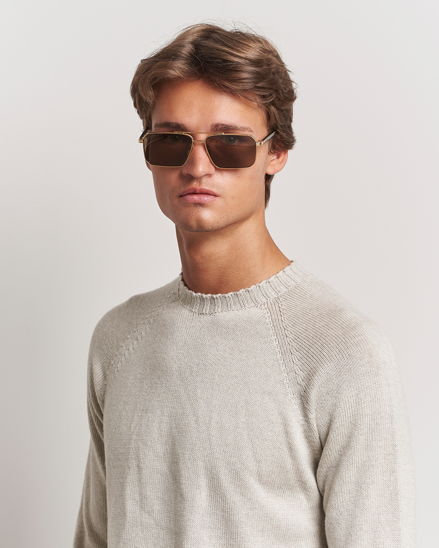 Prada 0PR A57S Metal Sunglasses Gold