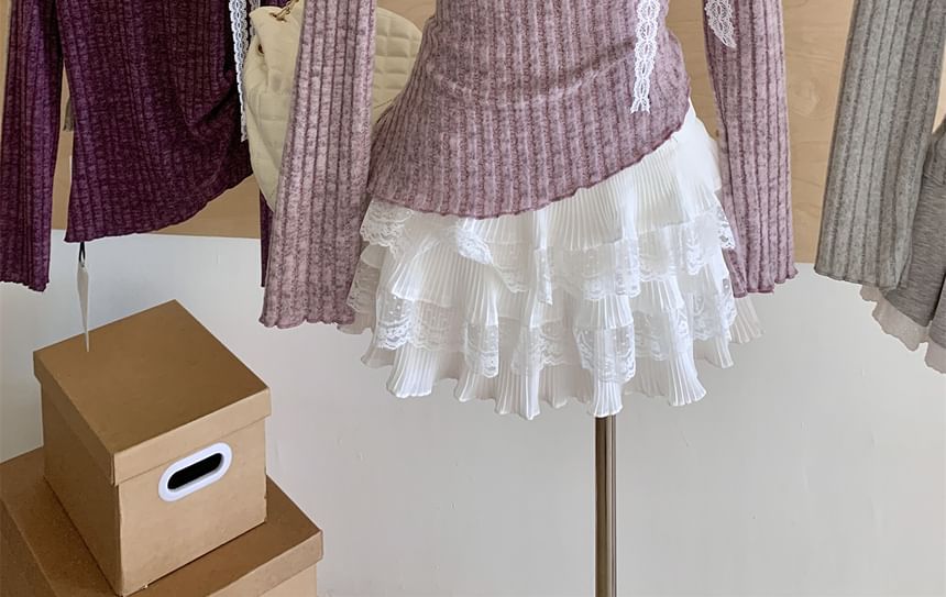 Dute - Asymmetrisch gebreide top met lange mouwen en boothals