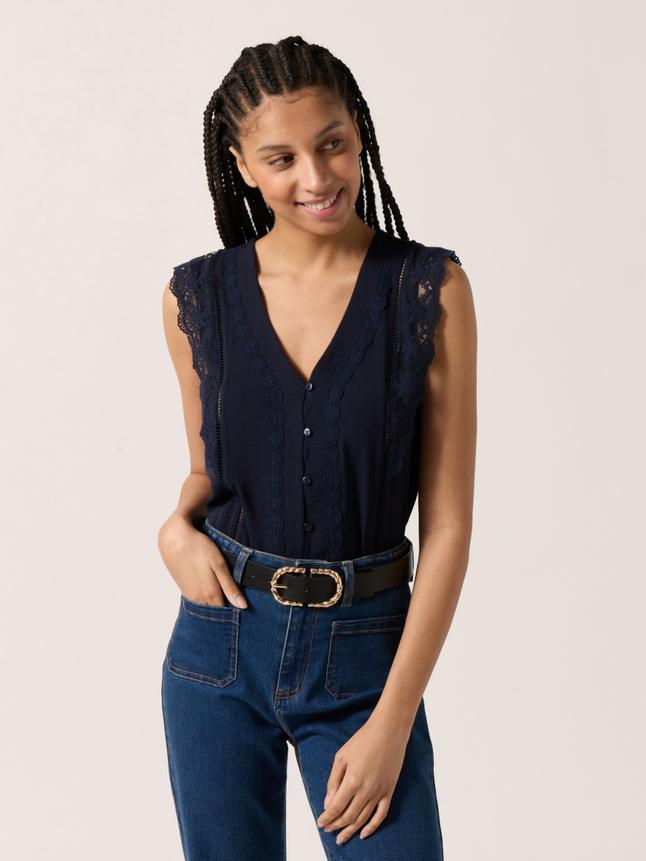 Top sans manches dentelles et col v