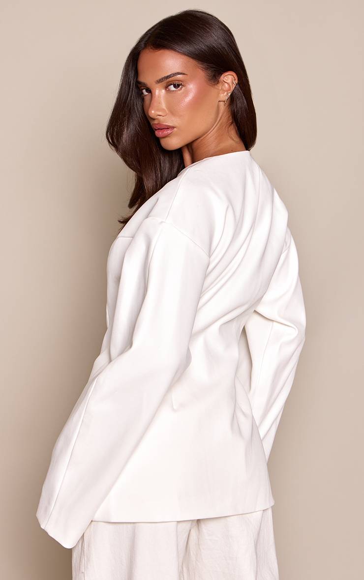 Crème Blazer Sans Col À Boutons Recouverts De Tissu