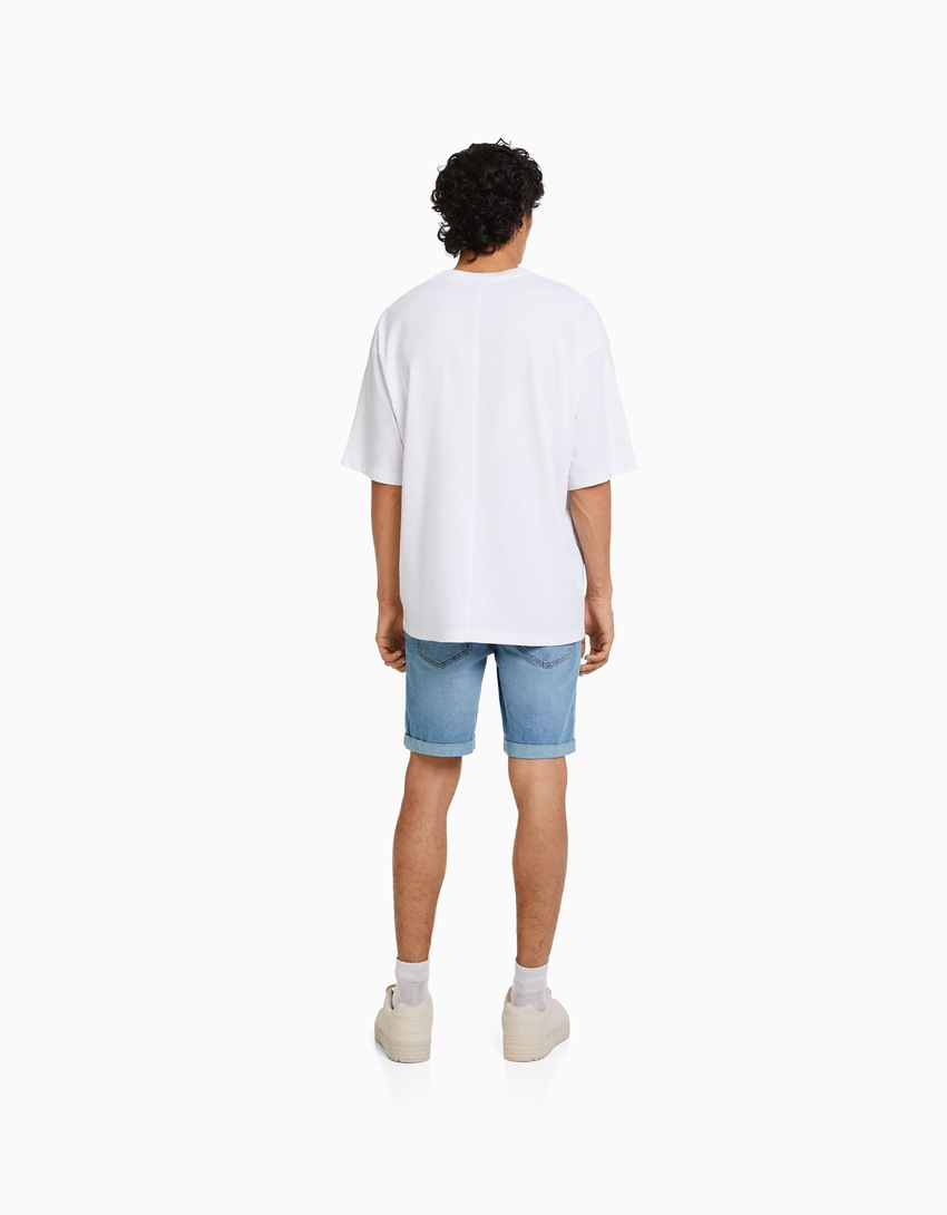 Bermuda jeans skinny com barra dobrada