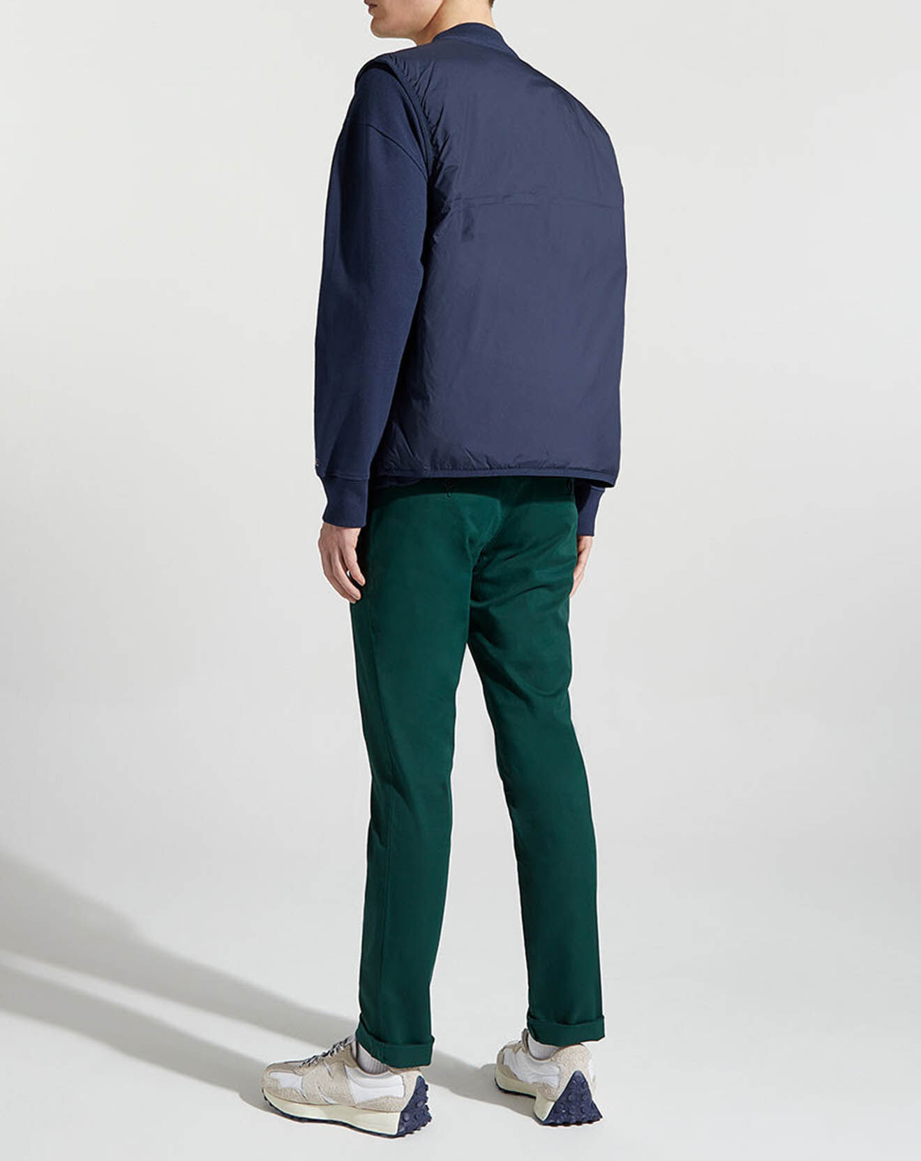 Tommy Jeans Blouson light sans manches Signature bleu marine