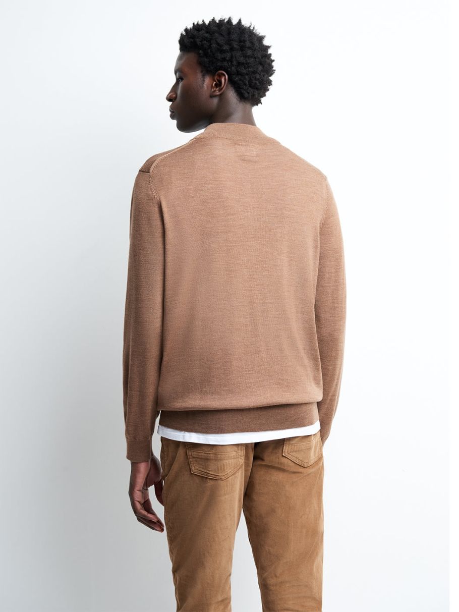 Pull col montant zippé en laine mérinos