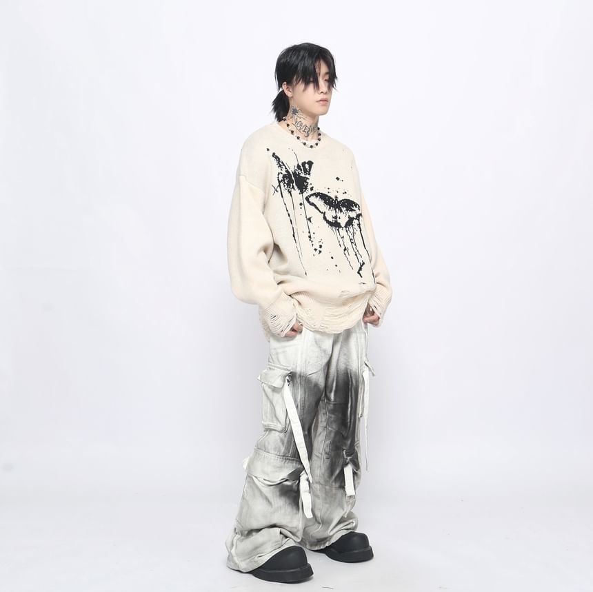 Derbundy - Oversized trui met ronde hals en vlinderprint
