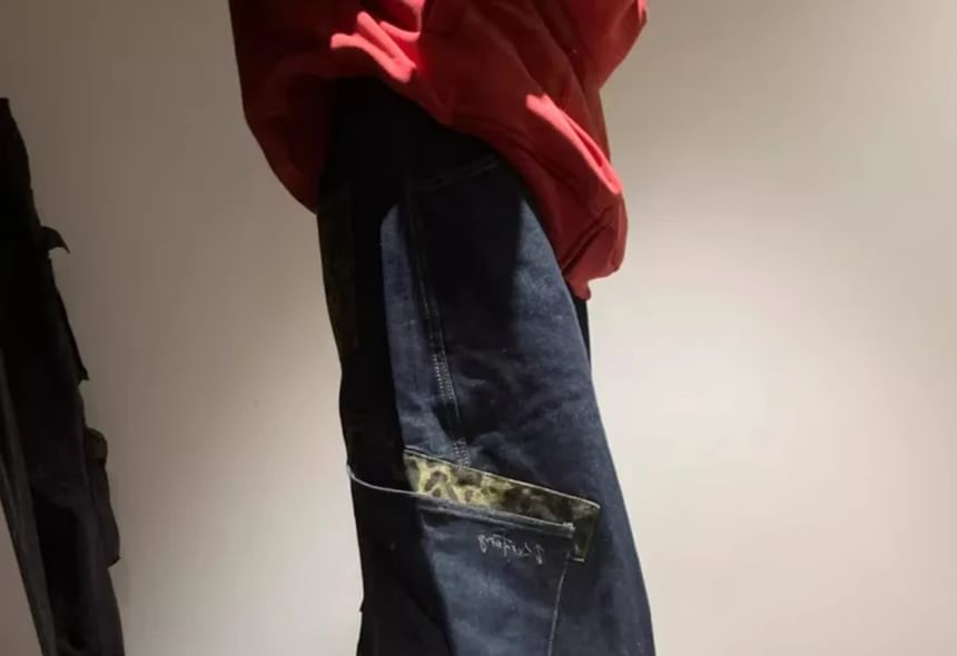 Litoya - Lage taille jeans met gewassen luipaardprint en wijde pijpen