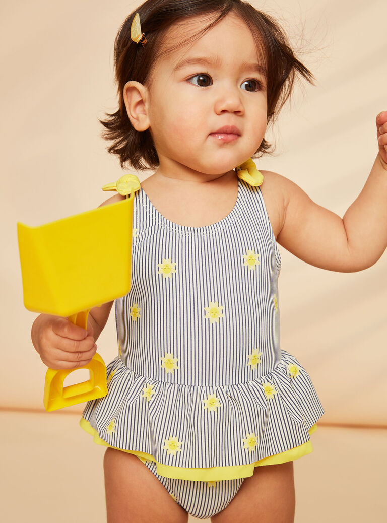 Maillot de bain 1 pièce bleu marine et jaune à imprimé à rayures et soleils