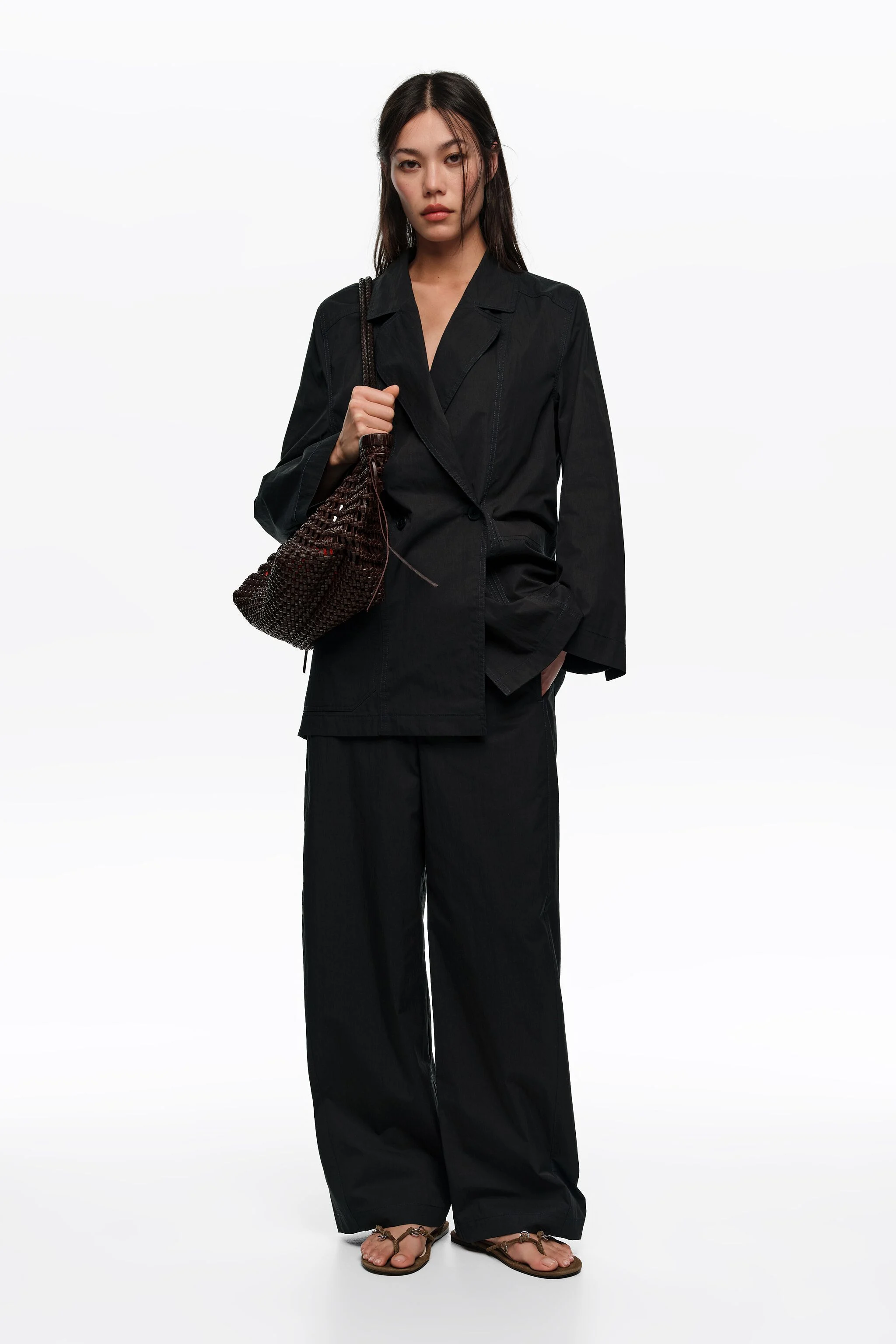 Blazer preto de alfaiataria com pesponto