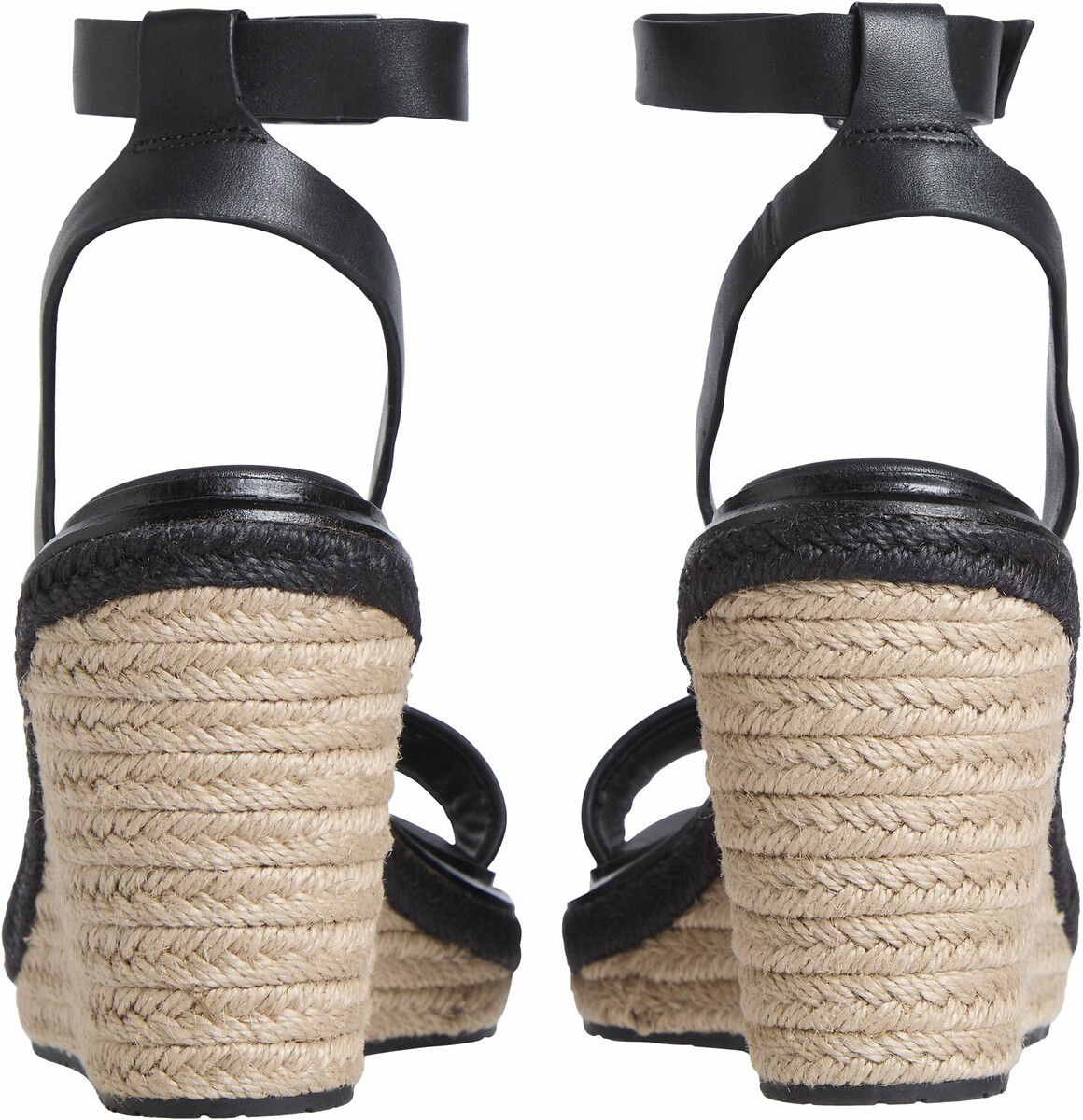 CALVIN KLEIN JEANS<br>Sandálias de plataforma, em couro.