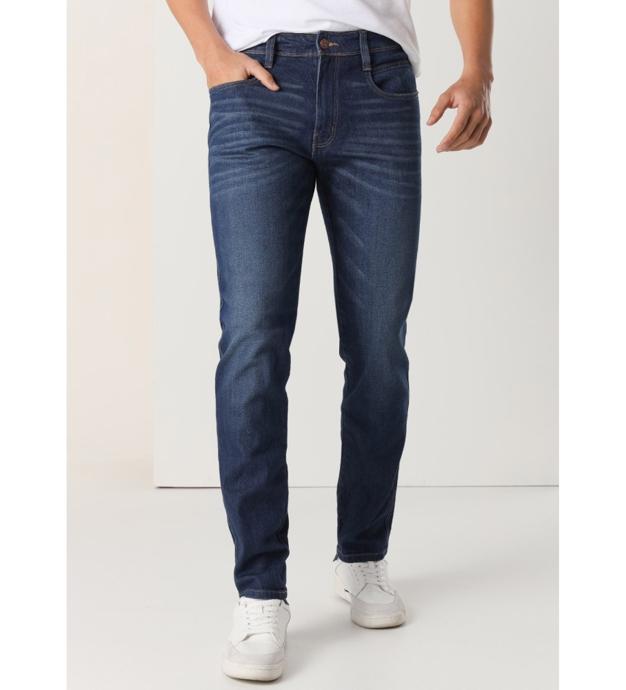 Calça jeans Lois de cintura média e corte slim, azul.