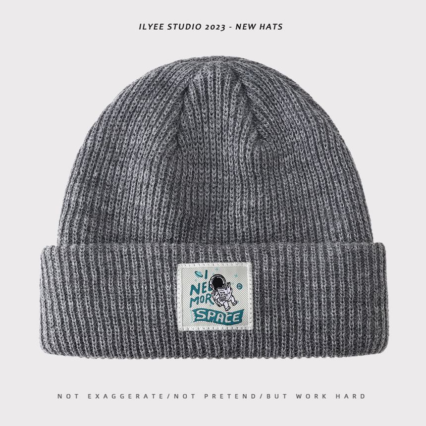 Uweiifame - Effen muts met appliqué