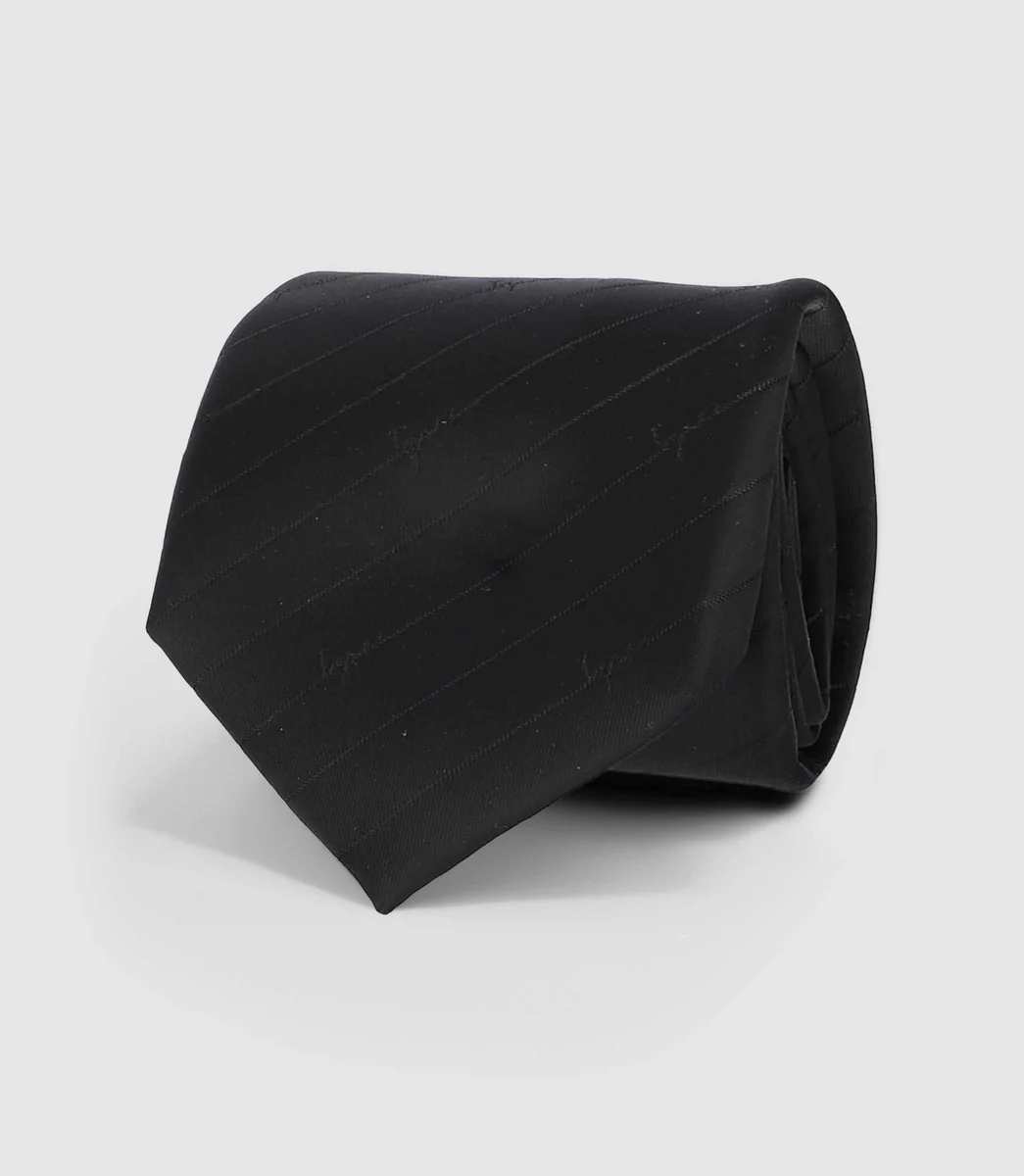 Cravate en soie noir à motifs UNIVERS