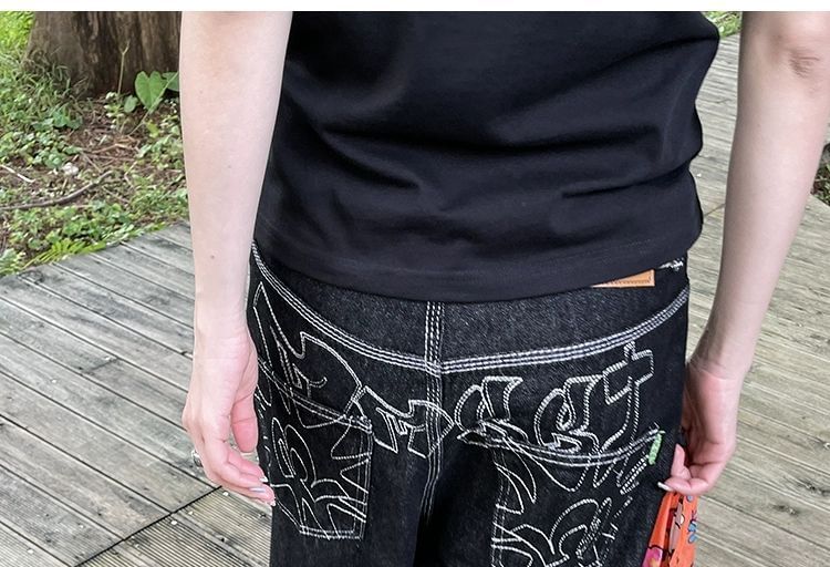 Jerolenea - Lage taille jeans met geborduurd contraststiksel en wijde pijpen