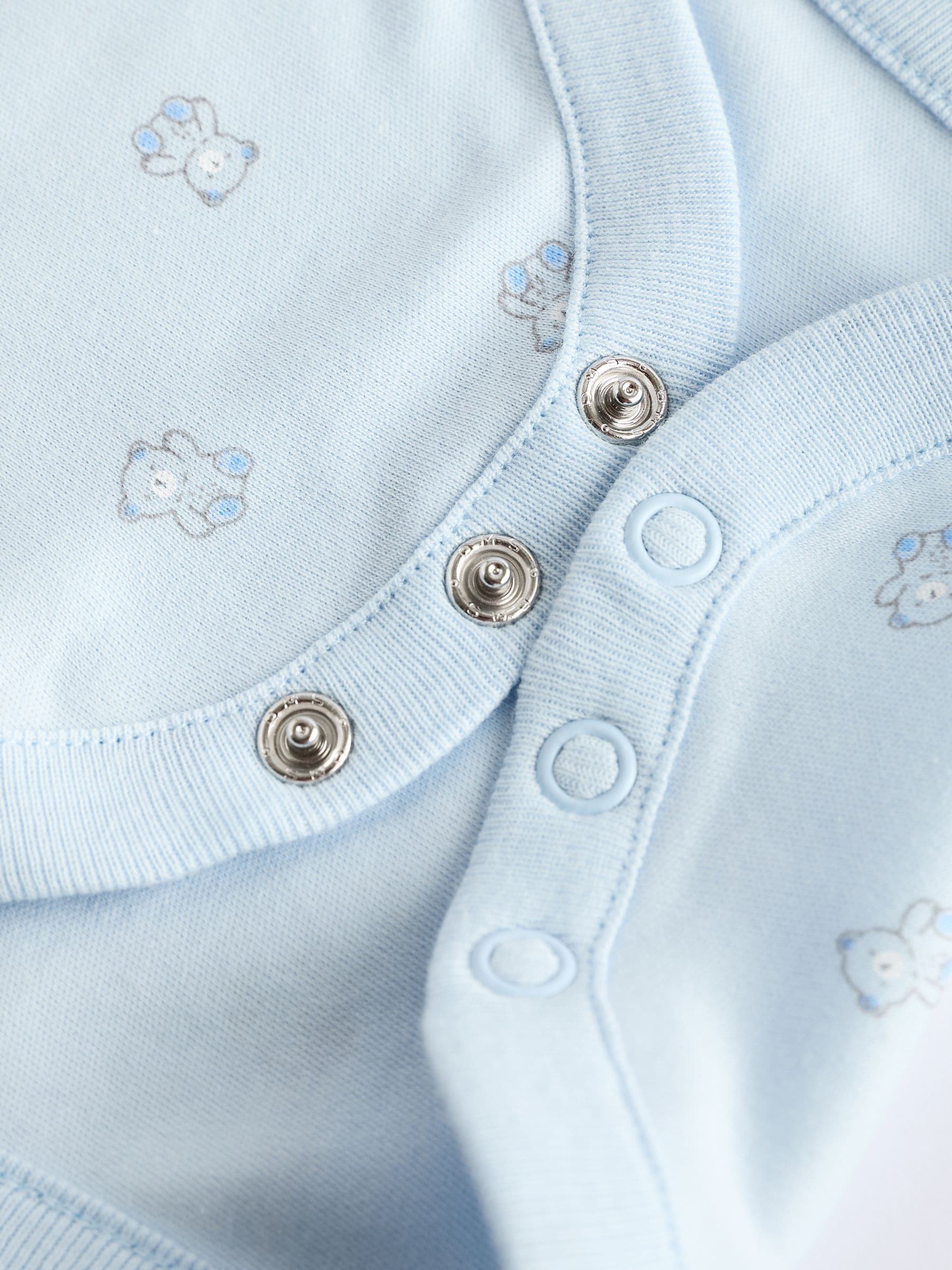Blauw met beerprint - 5 babyhemdjes