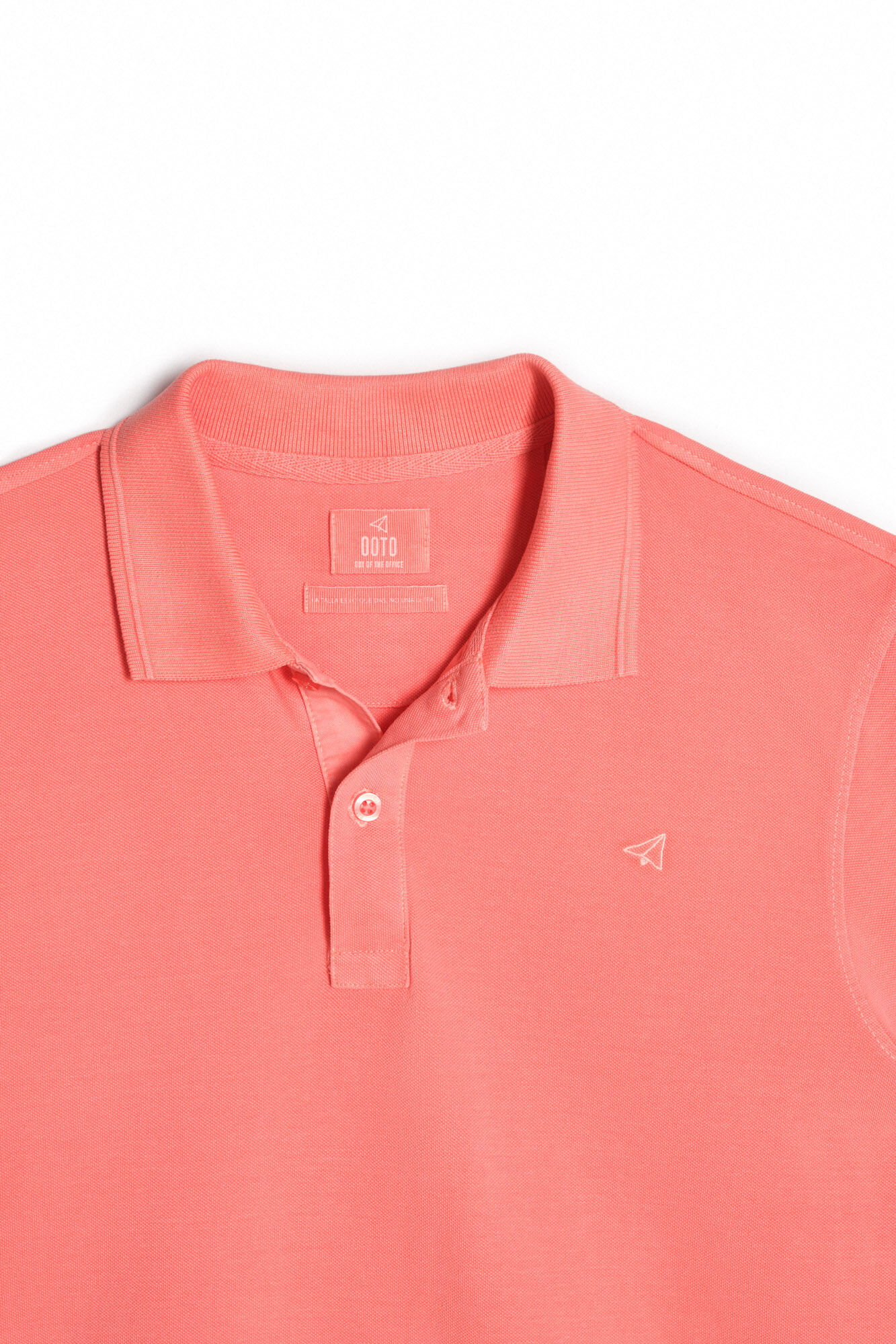 Camisa polo em piqué lavado com bordado de avião - Coral