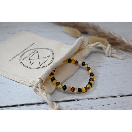 Bracelet Ambre bébé   Multi        de               Irréversible