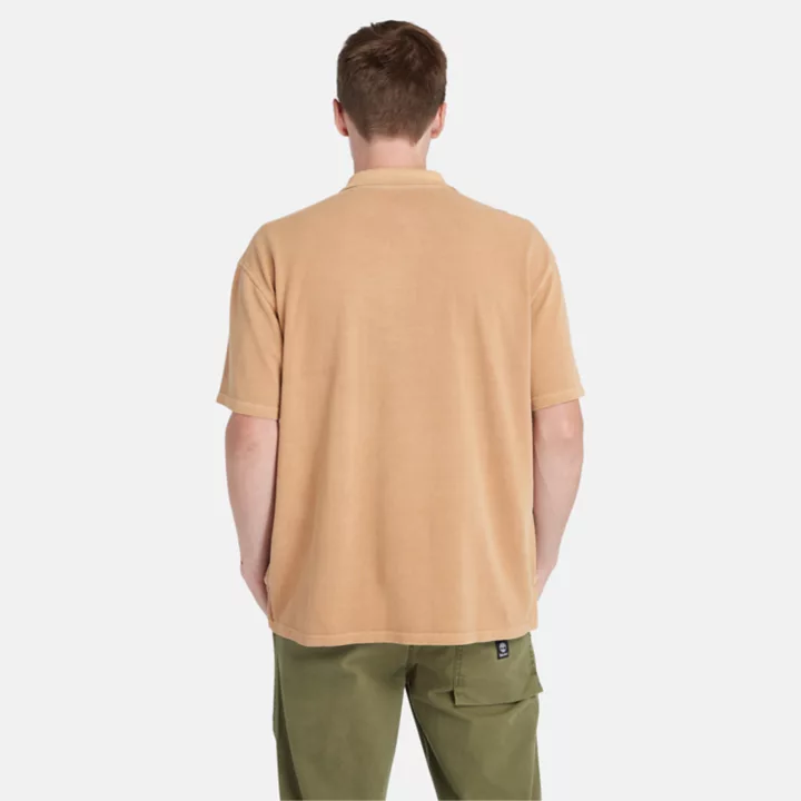 Polo court teint en plongée pour homme en orange