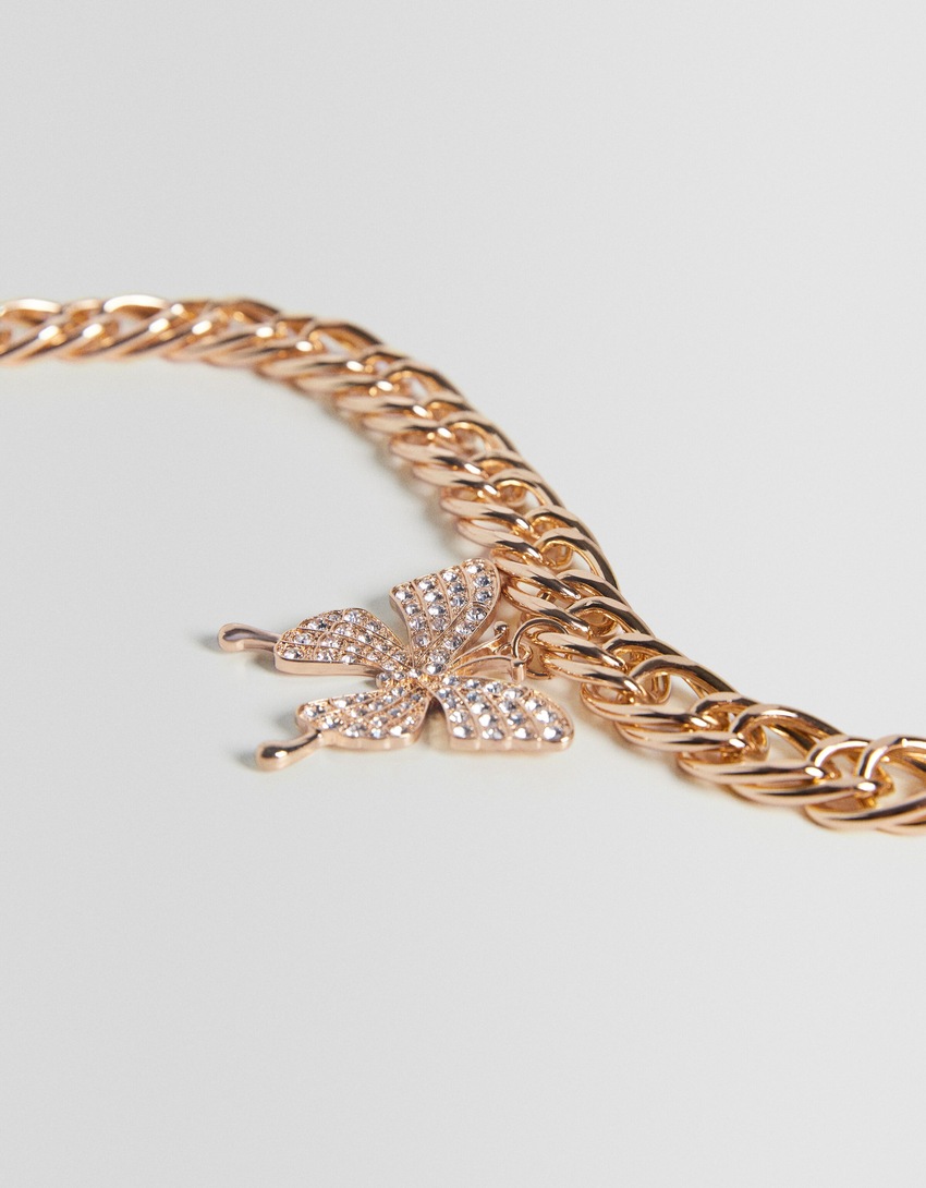 Colar gargantilha com corrente e borboleta de strass