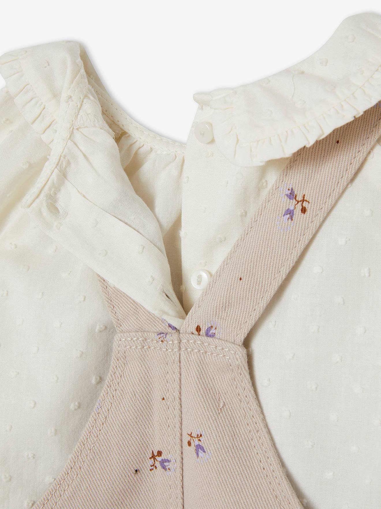Conjunto de body e blusa para bebê, bege médio com estampa.