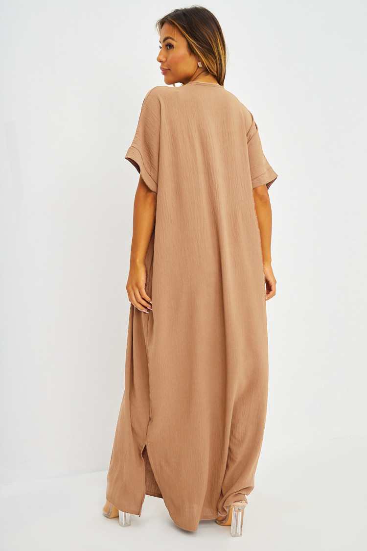 Abaya beige à broderies dorées