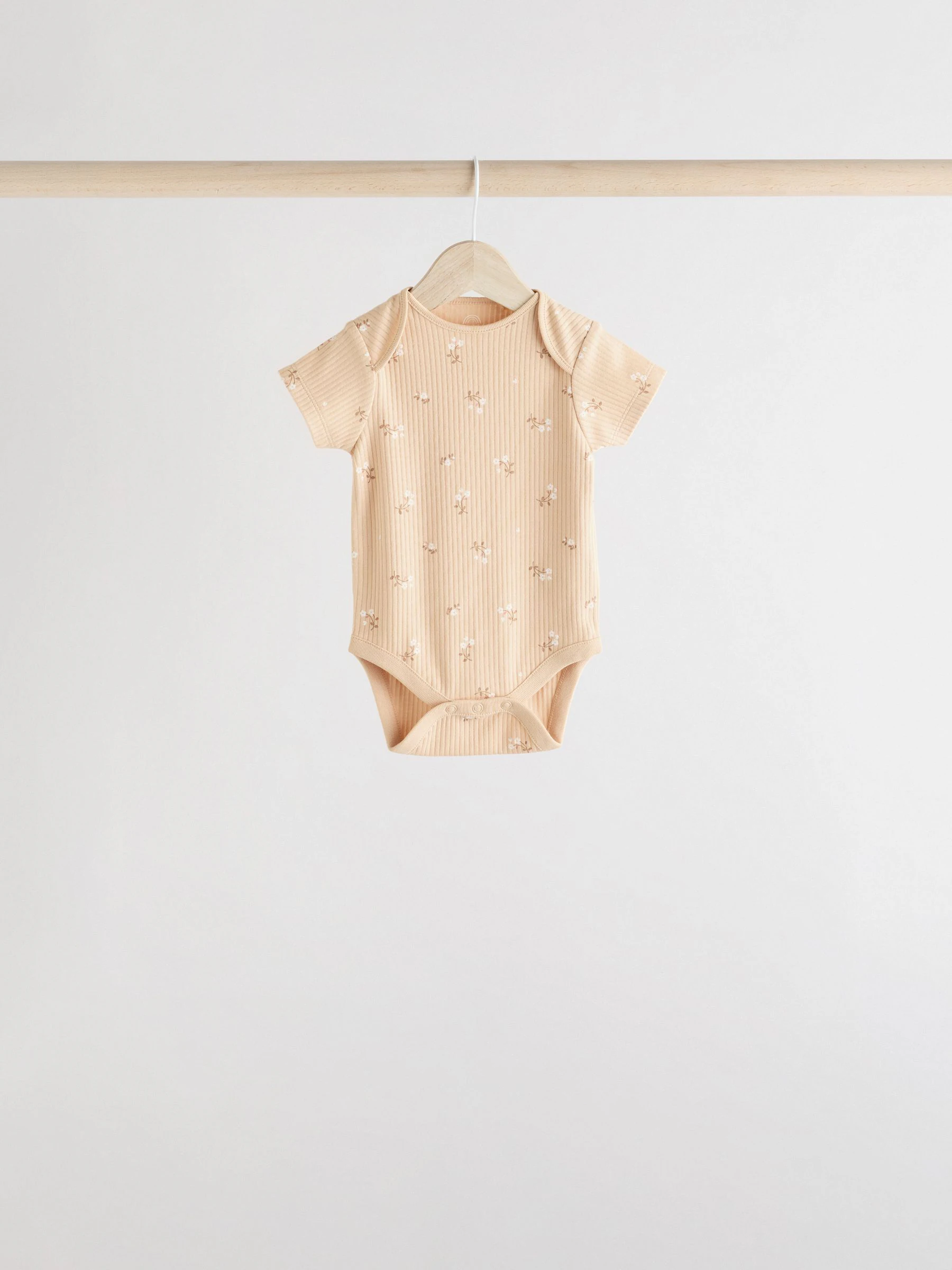 Abrikooskleur met fijne print - 5 Babyrompertjes met korte mouwen