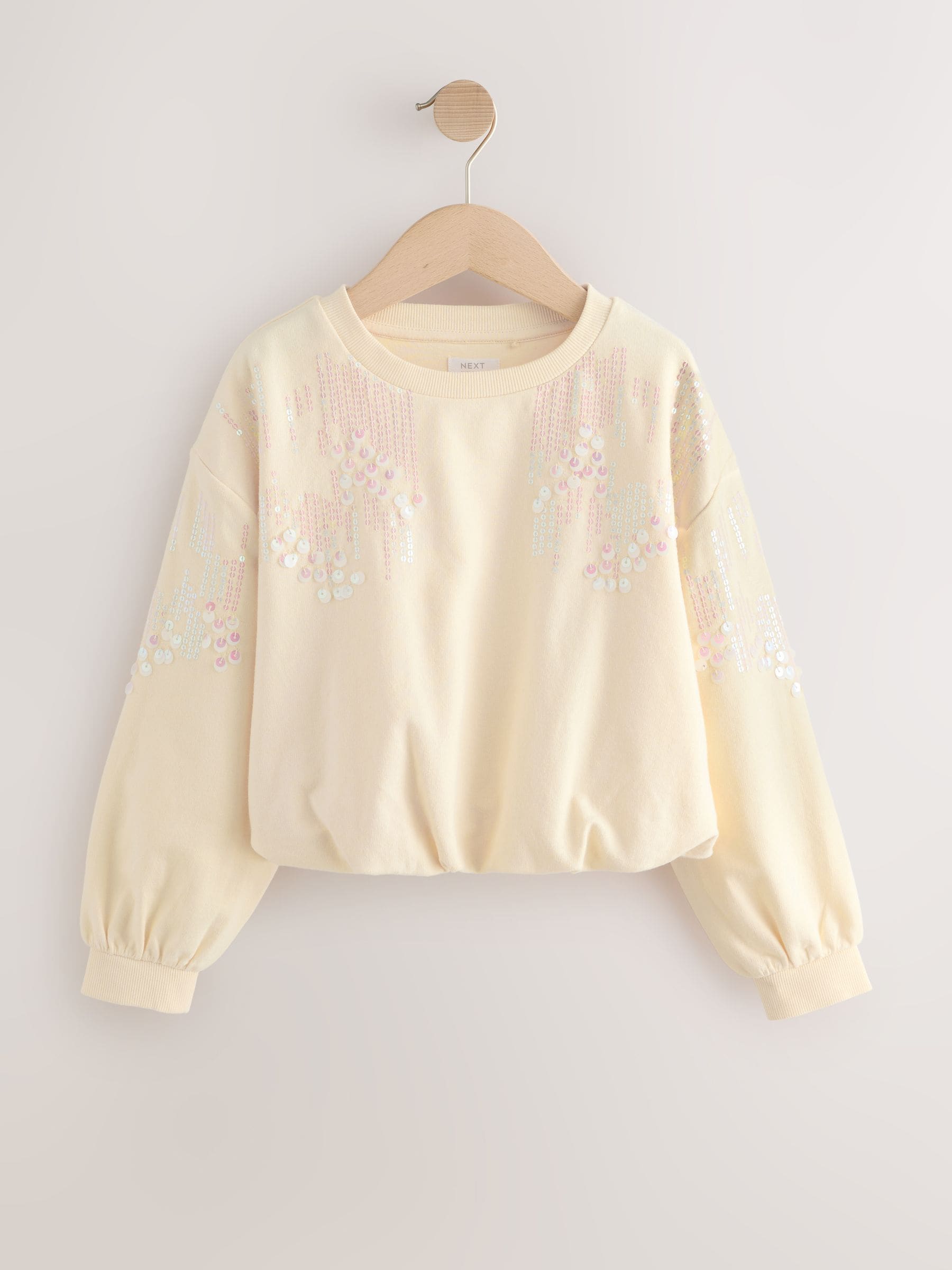 Crème - Sweatshirt met lange mouwen, pailletten en bolle zoom (3-16jr)
