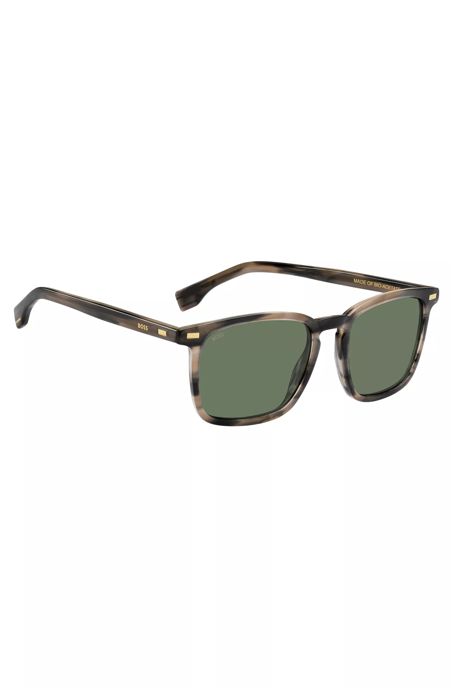 Óculos de sol BOSS em acetato preto com detalhes em chifre e rebites metálicos.