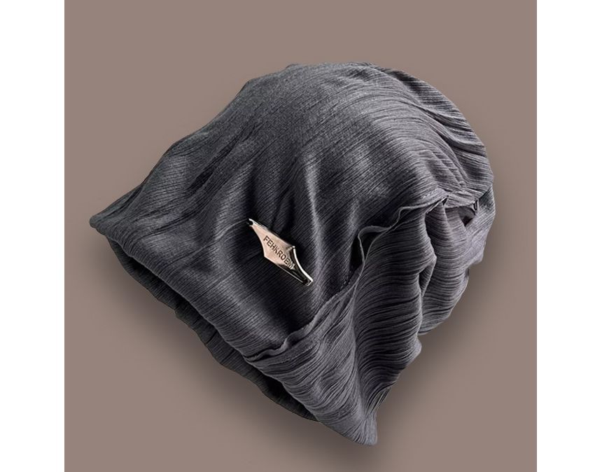 TAAK - Slouchy muts met appliqué