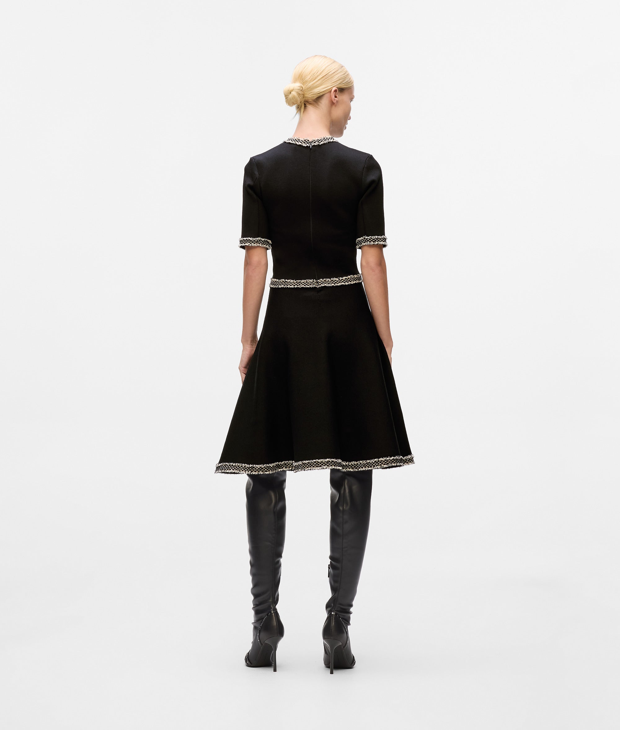 Gebreide jurk met bouclédetails