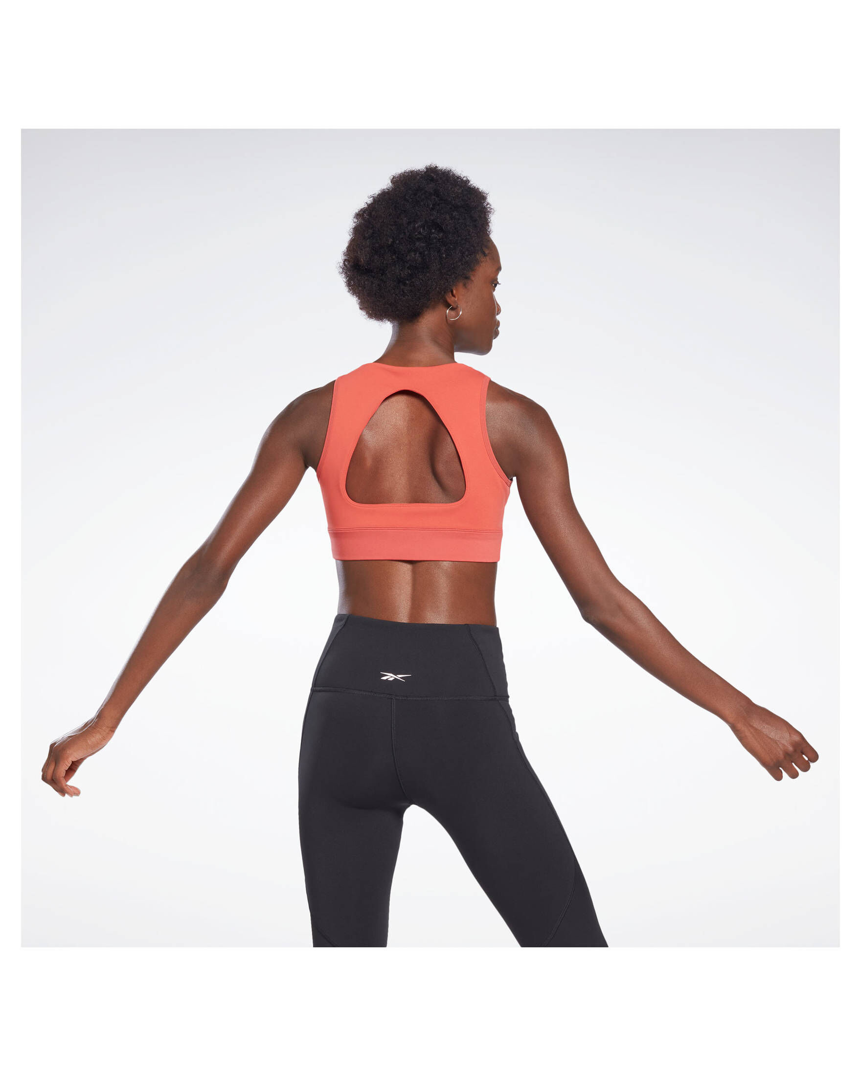 Reebok| Damen Trainingsbustier STUDIO BEYOND THE SWEAT CROP