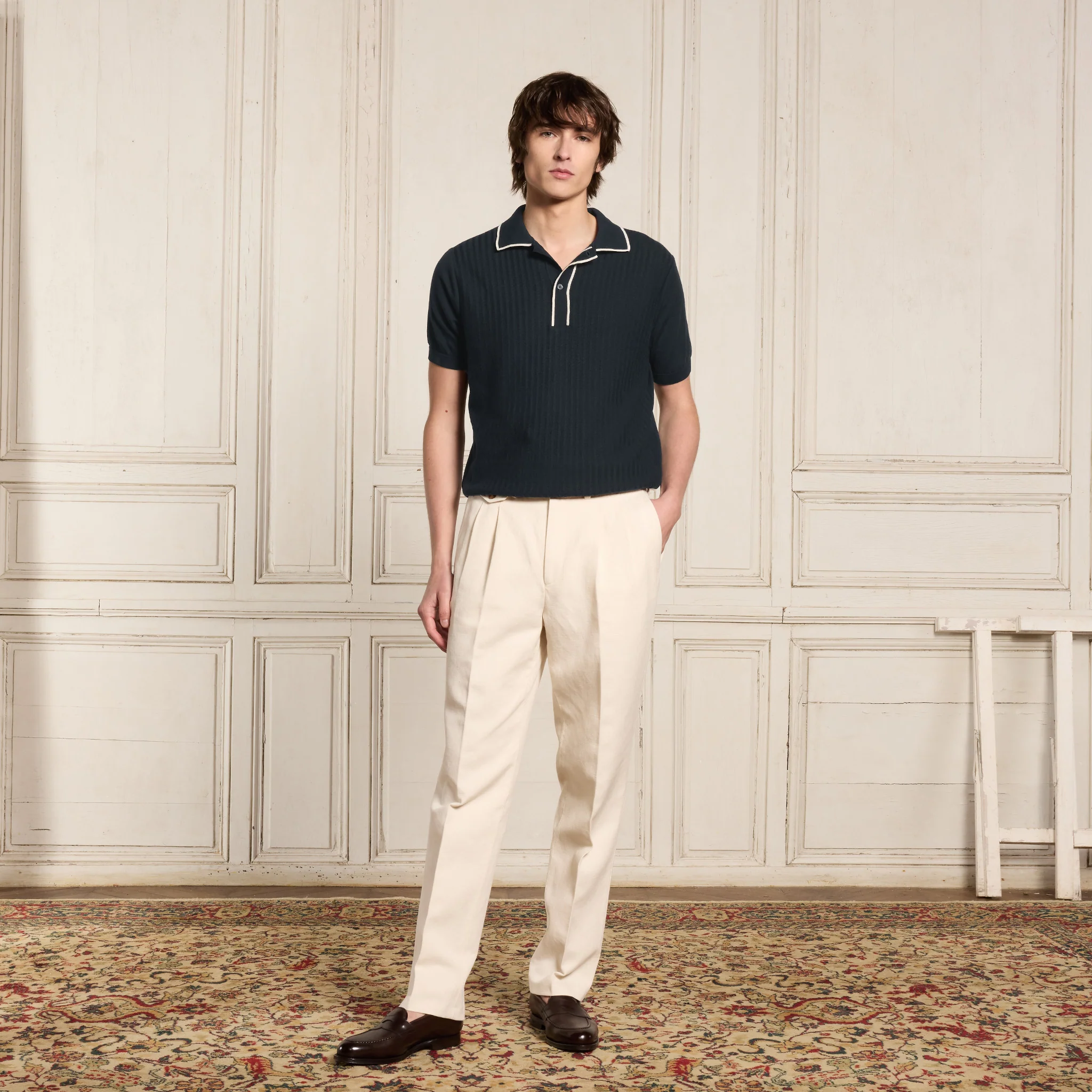 Navy and ecru knit polo shirt