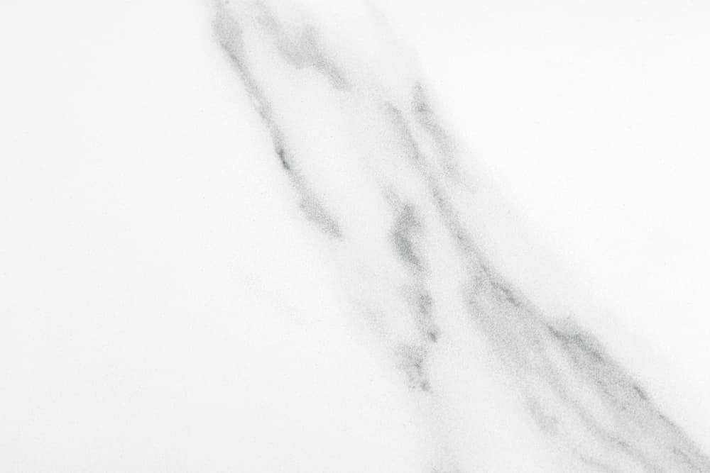 Ausziehbarer Esstisch ALPINE 160-200cm weiß Keramik Marmor schwarzes Metallgestell