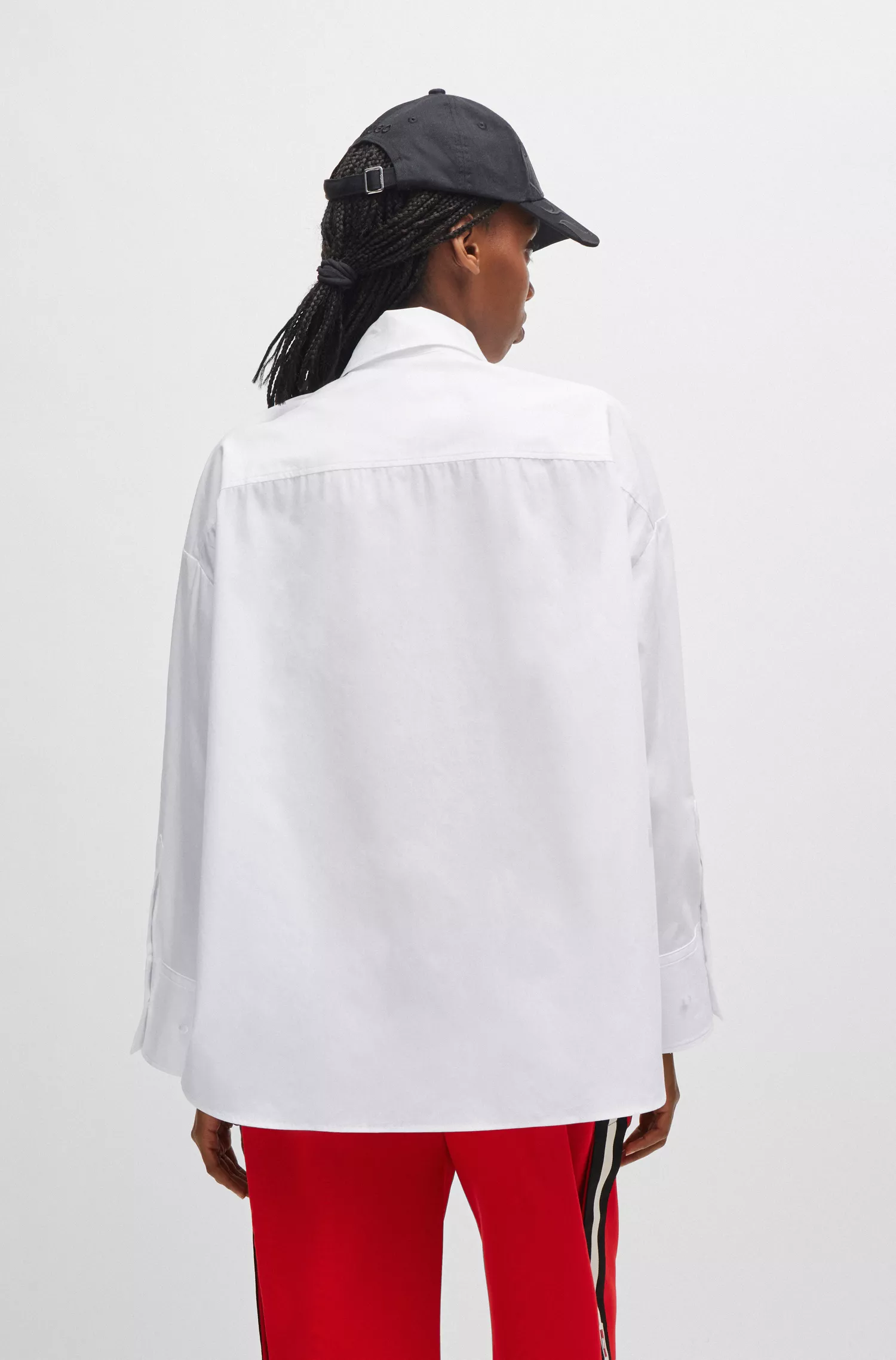 Blusa HUGO vermelha de modelagem ampla em lona de algodão com logo da estação.