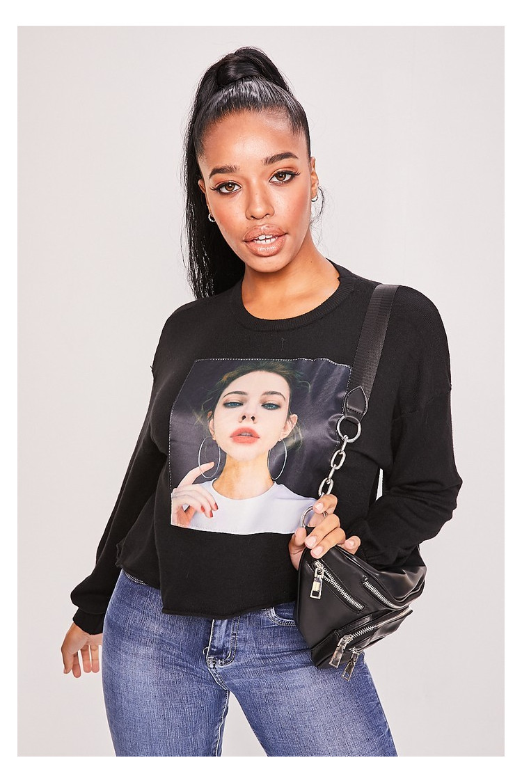 Pull noir tête de femme