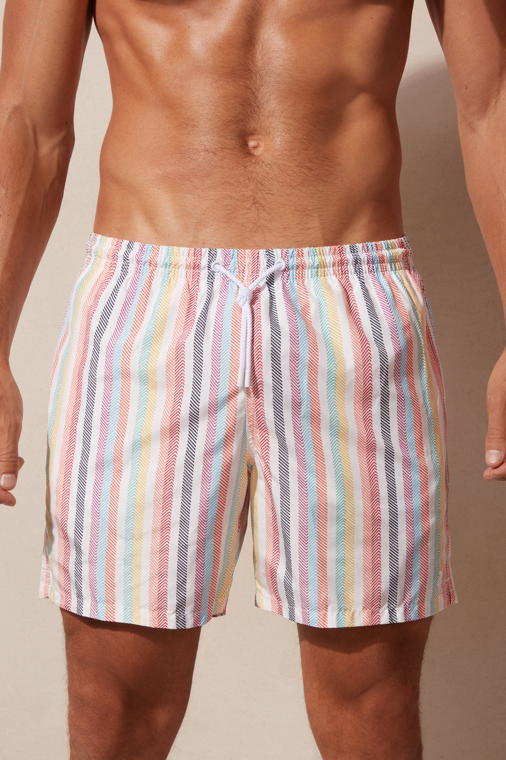 Maiô boxer com estampa listrada multicolorida