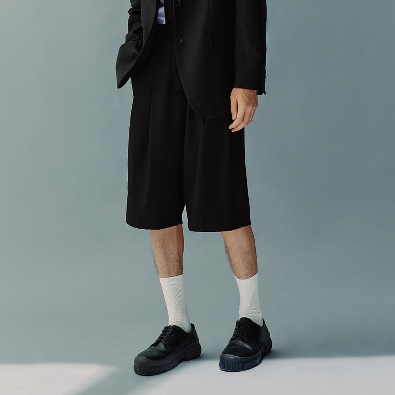 Adotuastic - Capri-broek met middelhoge taille en effen stof