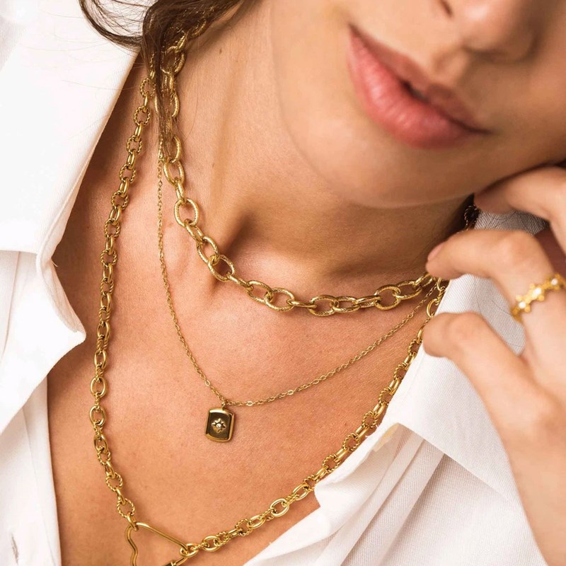 Collier double rangs en acier doré