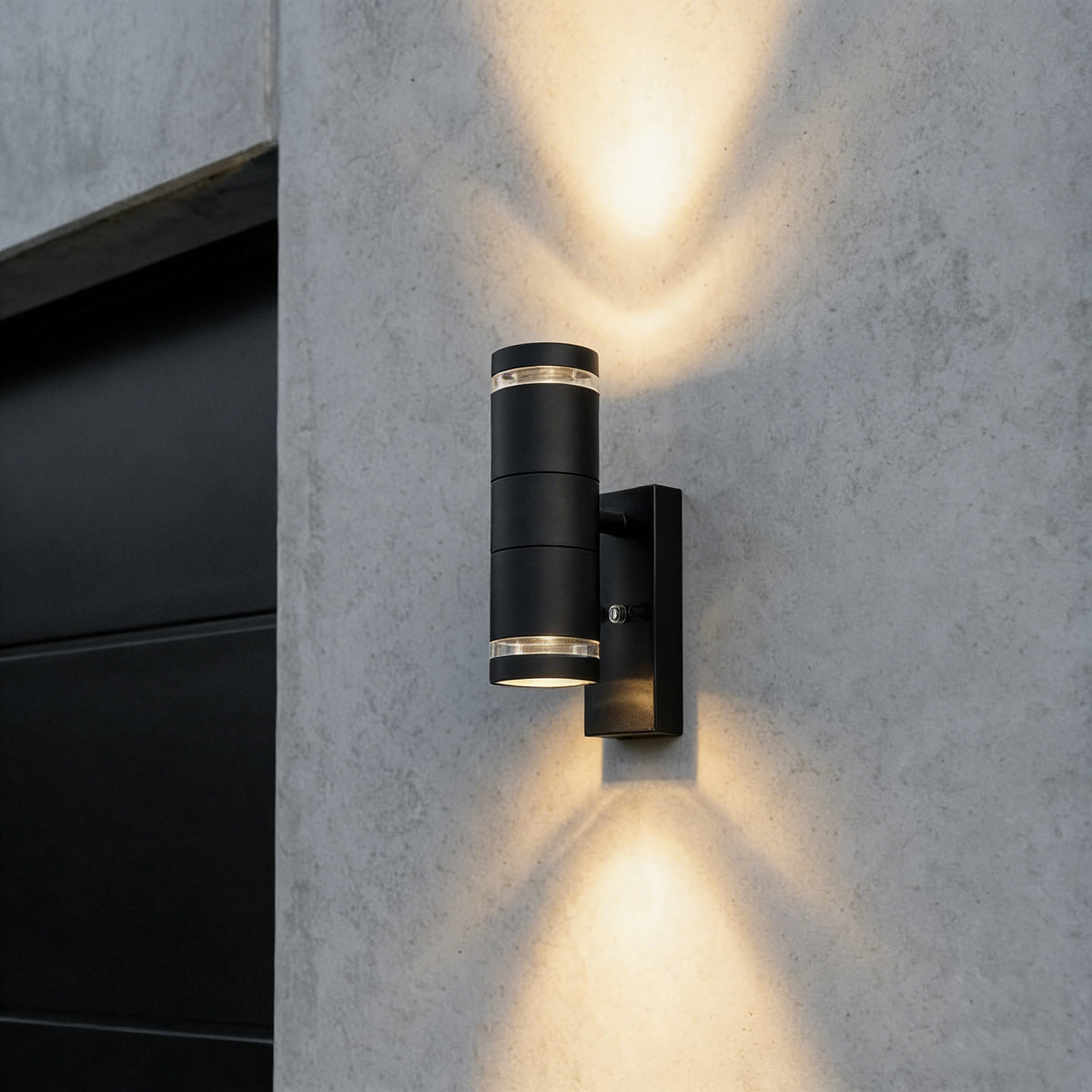 QAZQA Moderne buiten wandlamp zwart 2-lichts IP44 met schemersensor -
