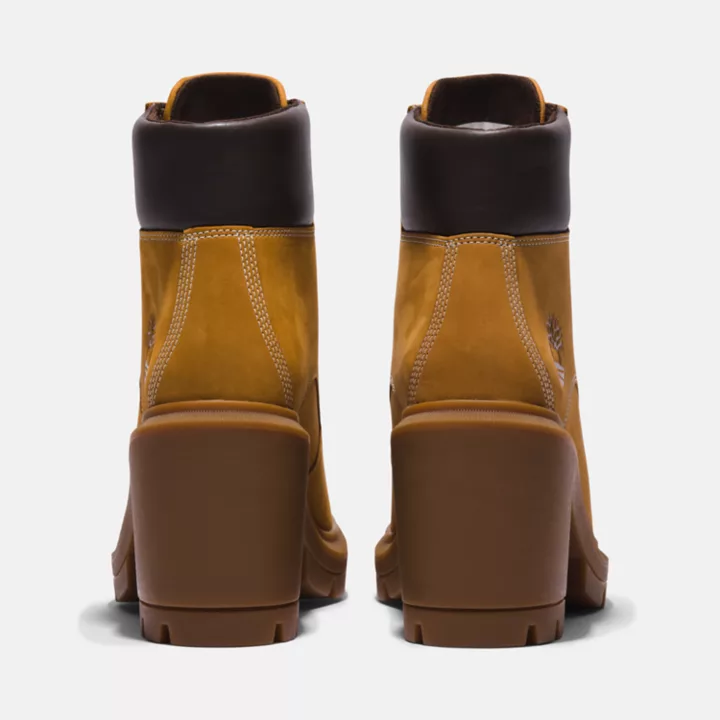 Bota feminina Allington de cano alto com cadarço, na cor amarela.