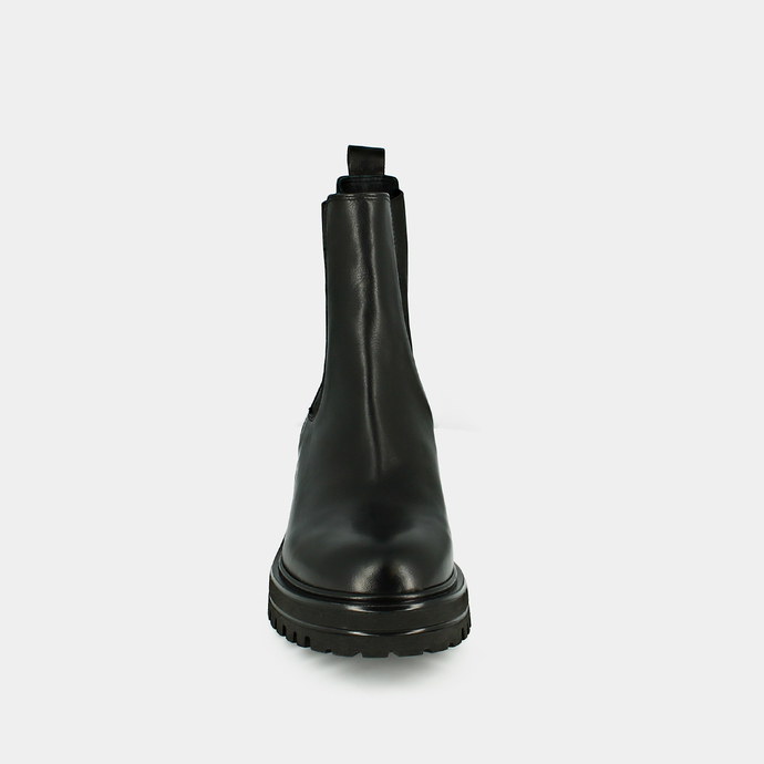 Boots à semelles crantées et élastiques  en cuir noir