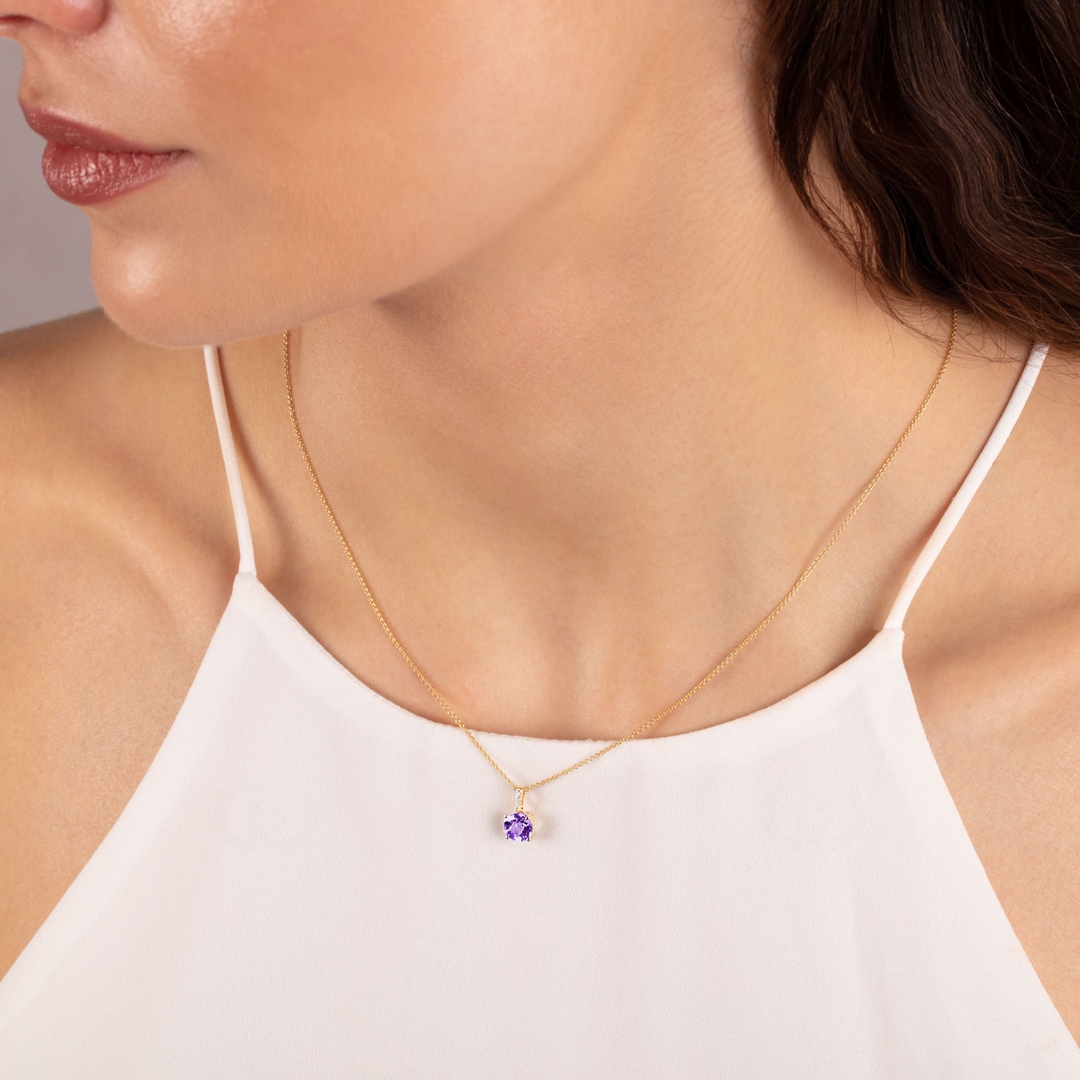 Anhänger 750/18 K Gelbgold mit Amethyst rund und Diamanten 0.01 ct H/si