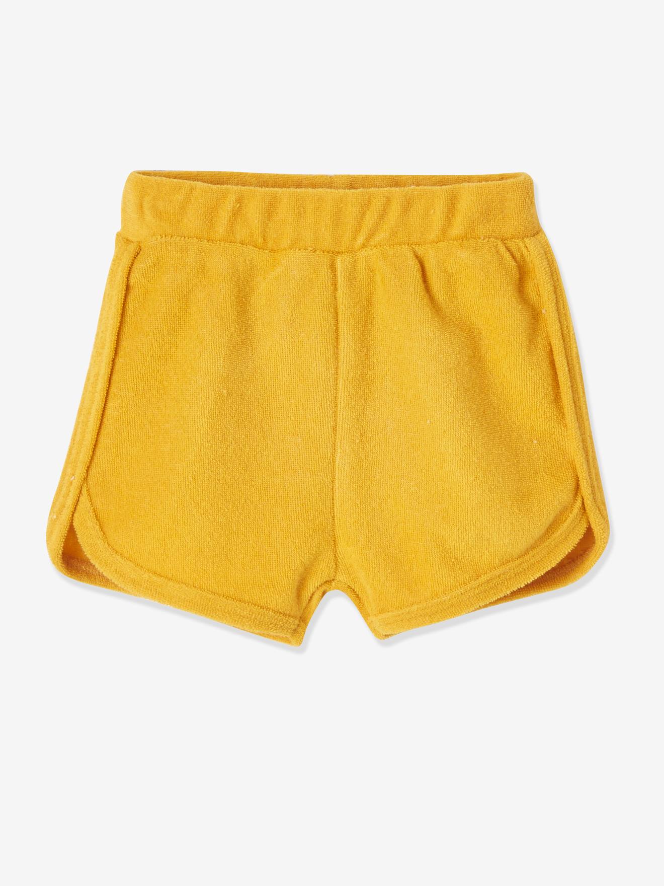 Pacote com 4 shorts de lã polar para bebê em dois tons de amarelo escuro/multicoloridos